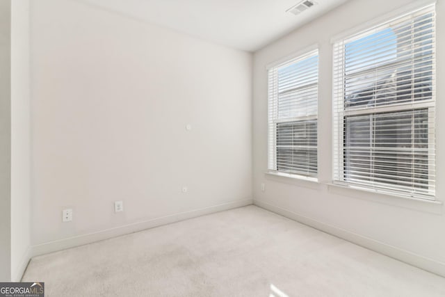 view of carpeted spare room