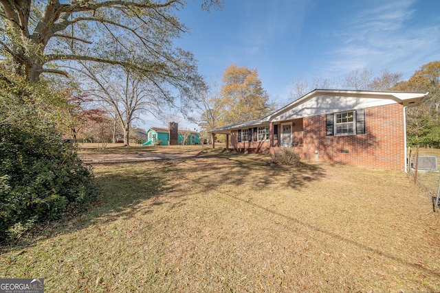 view of yard featuring covered porch