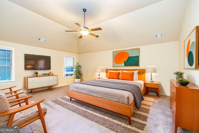 bedroom featuring ceiling fan, carpet floors, and high vaulted ceiling