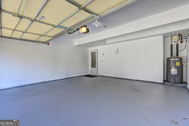 garage featuring electric water heater and a garage door opener