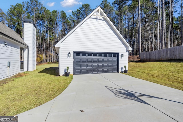 garage with a yard