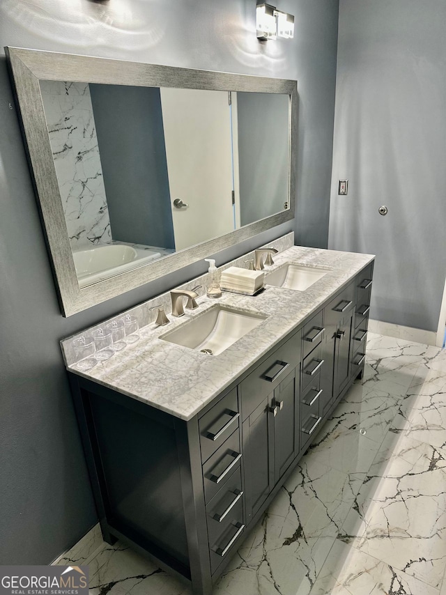 bathroom with vanity and a tub to relax in