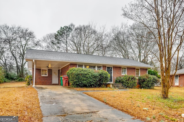 ranch-style home with a carport