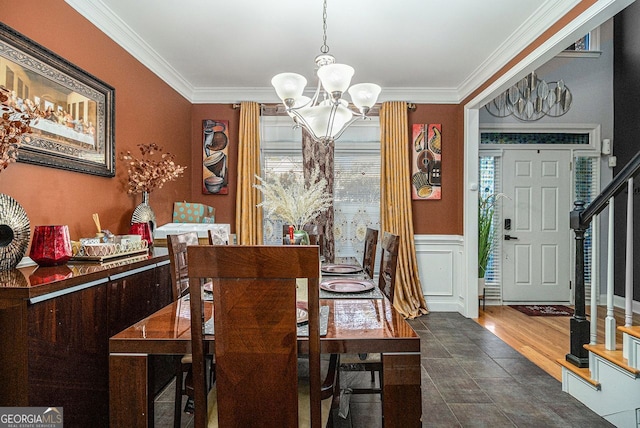 dining space featuring a chandelier, crown molding, and dark wood-type flooring