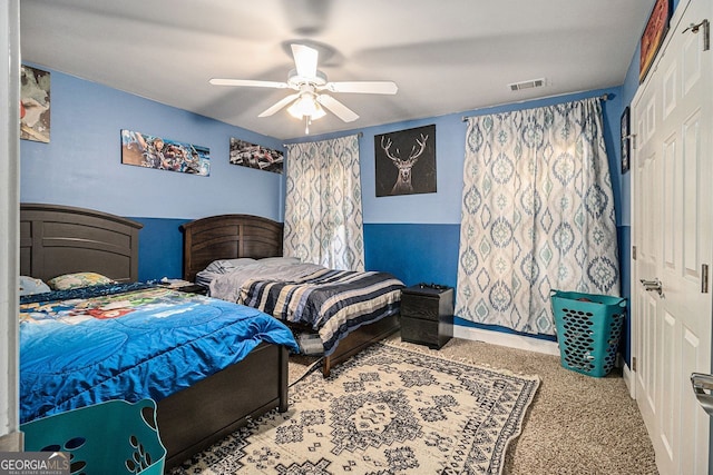 bedroom with light colored carpet and ceiling fan