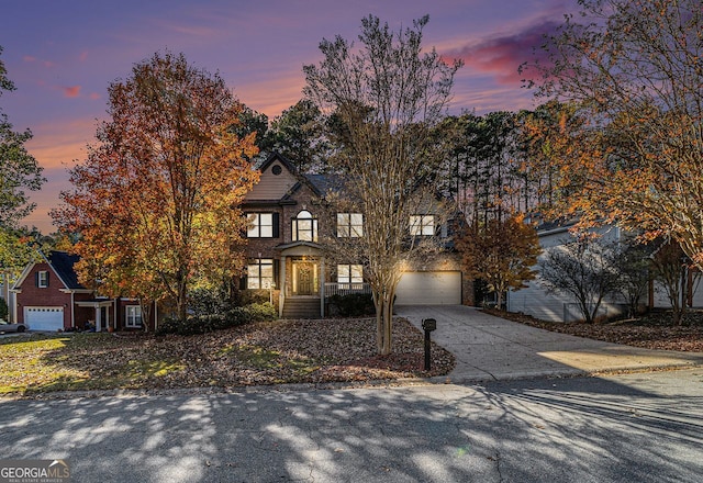 view of front of property with a garage