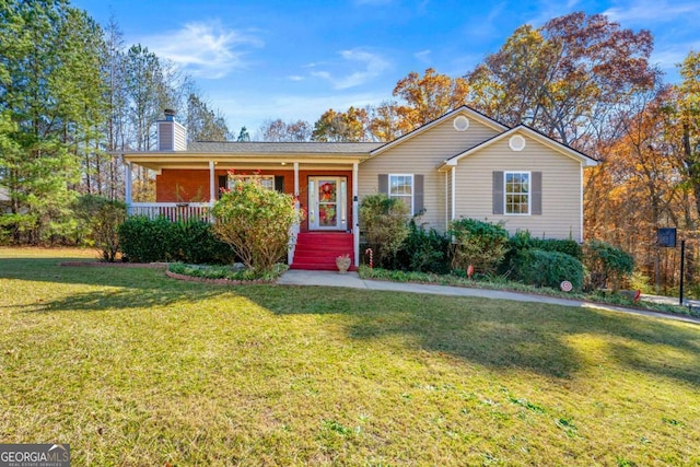 ranch-style house featuring a porch and a front lawn