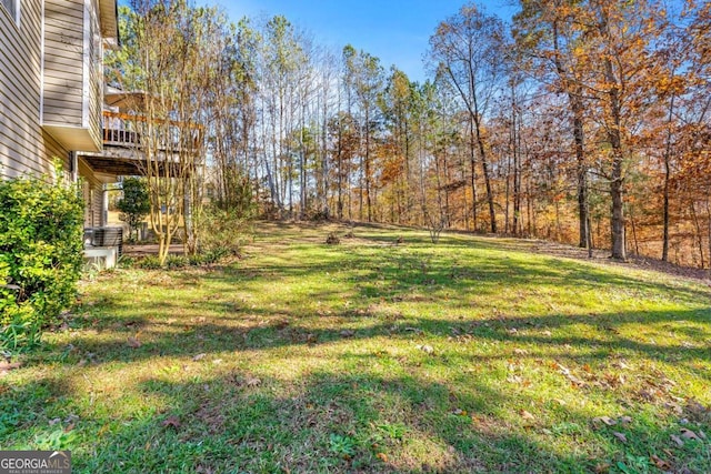 view of yard with a deck