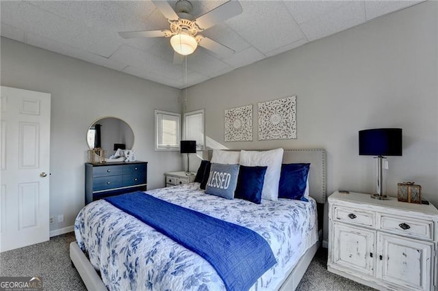 bedroom with ceiling fan and light colored carpet