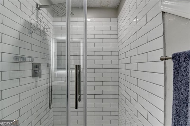 bathroom featuring an enclosed shower