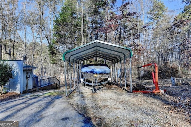 view of vehicle parking with a carport