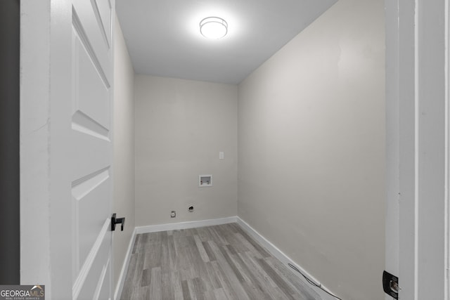 laundry area featuring hookup for a washing machine and light hardwood / wood-style floors