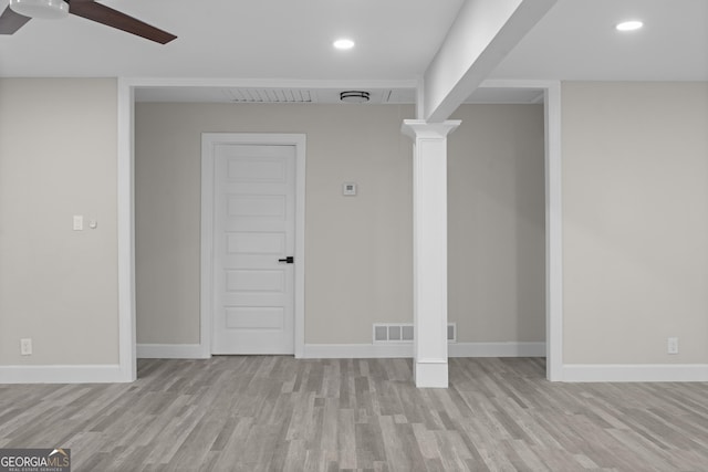 empty room featuring light hardwood / wood-style flooring and ceiling fan