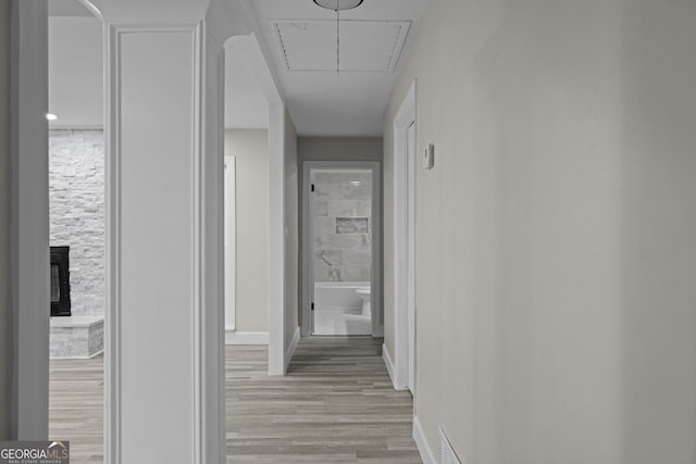 hallway featuring light wood-type flooring