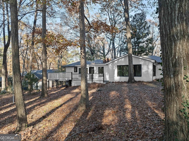 single story home with a deck