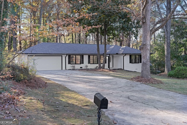 ranch-style home with a garage