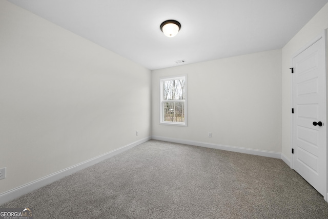 view of carpeted spare room