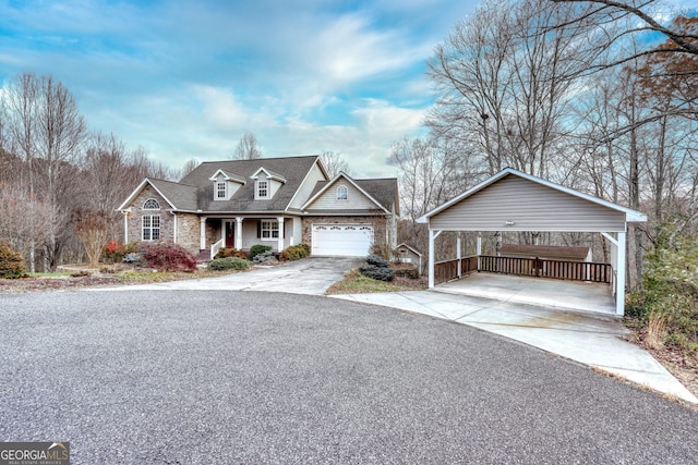 view of front of home featuring a garage and a carport