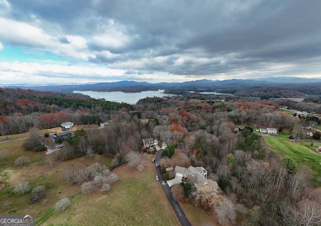 bird's eye view featuring a water and mountain view