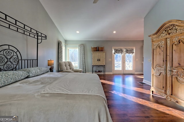 bedroom featuring french doors, access to outside, multiple windows, and dark wood-type flooring