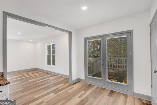 empty room with light wood-type flooring