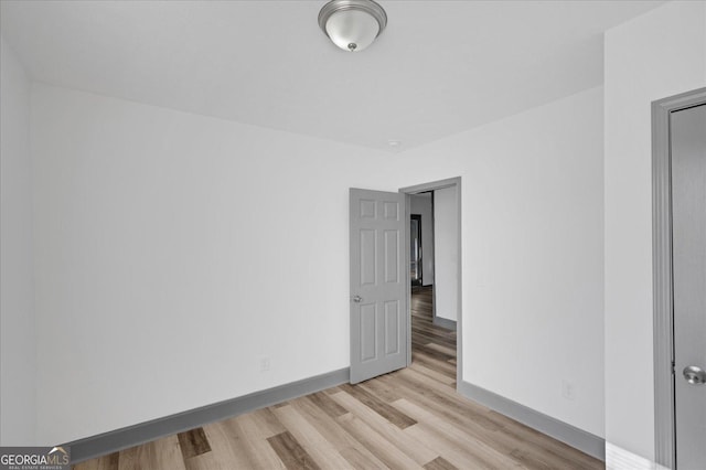 empty room featuring light hardwood / wood-style floors