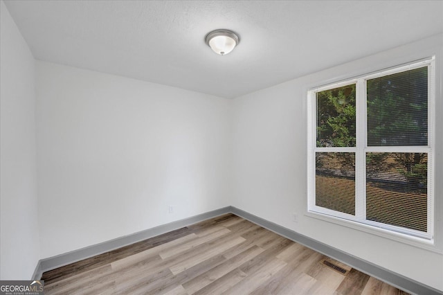 empty room featuring light hardwood / wood-style flooring