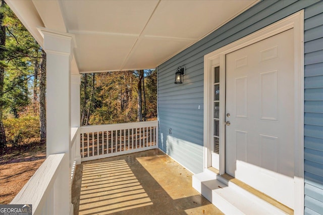 view of patio featuring a porch