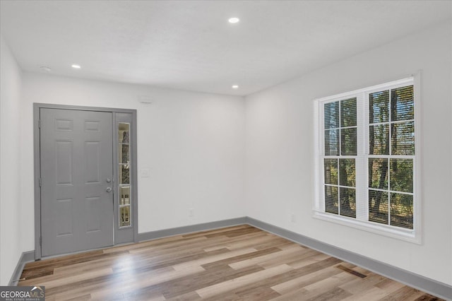 foyer entrance featuring light wood-type flooring