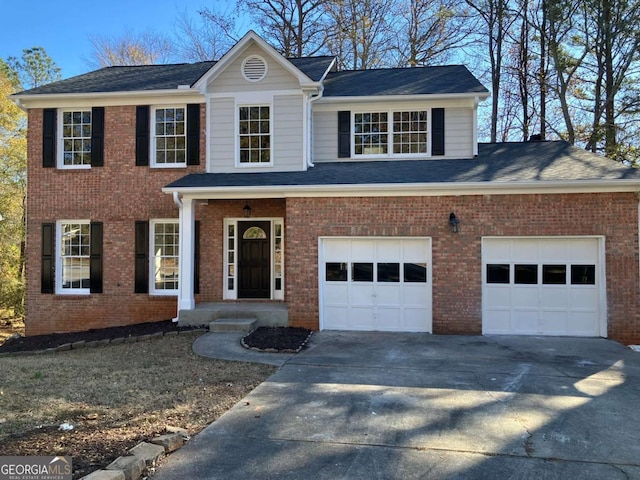 view of front of property with a garage