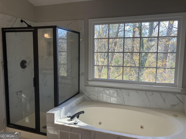 bathroom with independent shower and bath