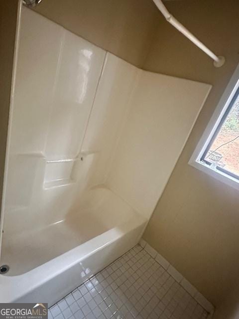 bathroom featuring tile patterned flooring