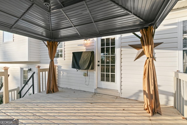 wooden deck featuring a gazebo