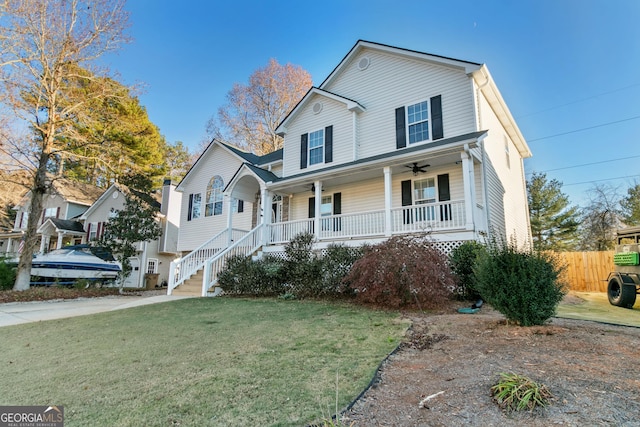 view of front of home with a front lawn and a porch