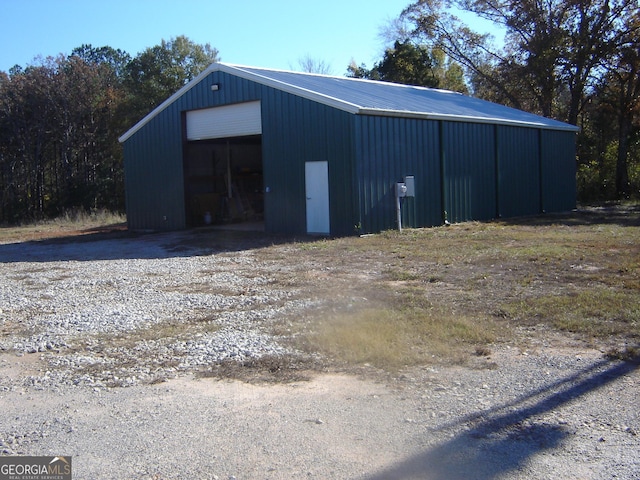 view of outdoor structure with a garage