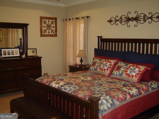 bedroom featuring ornamental molding