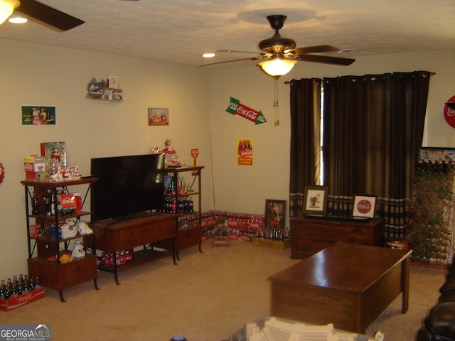 living room with a textured ceiling, ceiling fan, and light carpet