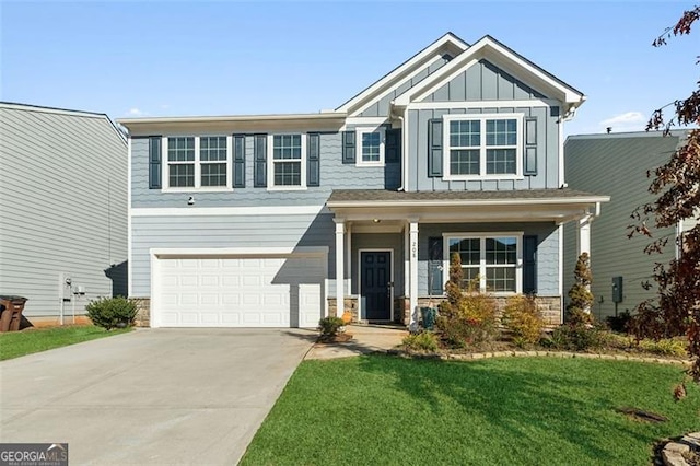 craftsman-style house with a front yard and a garage