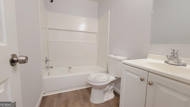 full bathroom featuring bathtub / shower combination, wood-type flooring, vanity, and toilet