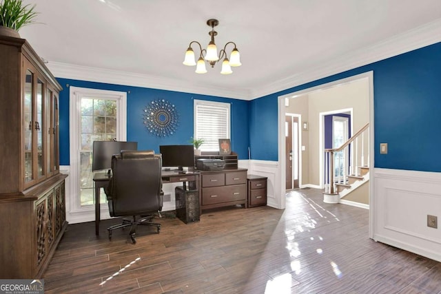 office space with crown molding, an inviting chandelier, and wood finished floors