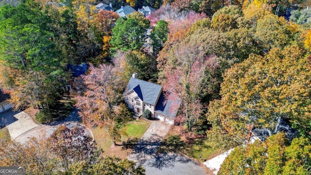 bird's eye view with a view of trees