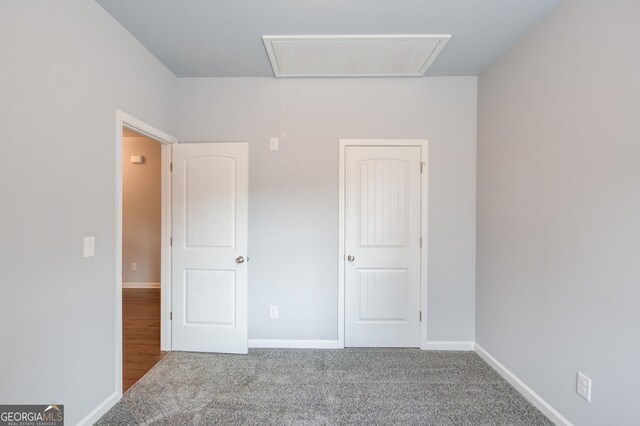 unfurnished bedroom with carpet flooring