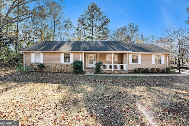 ranch-style home featuring covered porch