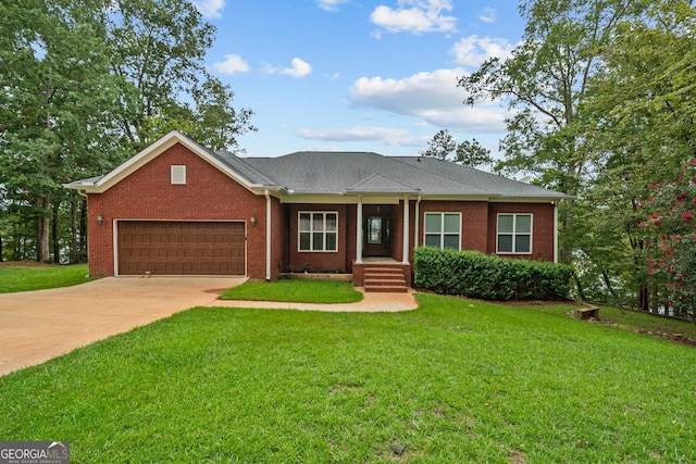 ranch-style house with a garage and a front lawn