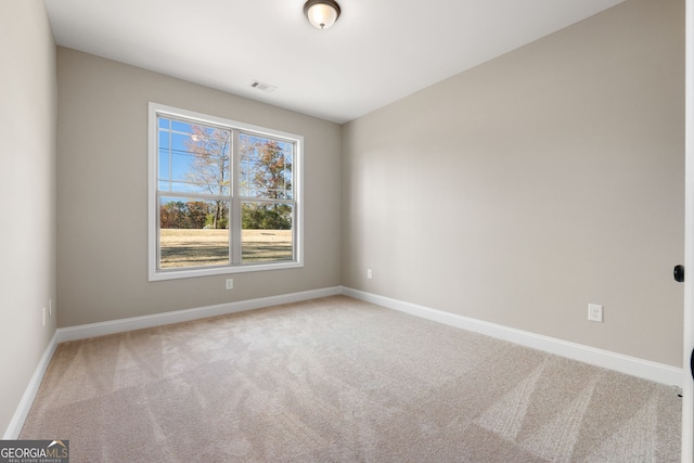 empty room featuring carpet