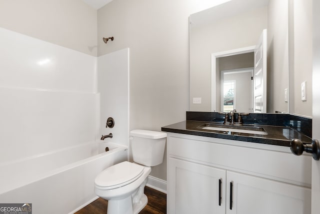 full bathroom with shower / bath combination, vanity, toilet, and wood-type flooring