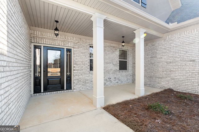 entrance to property with covered porch