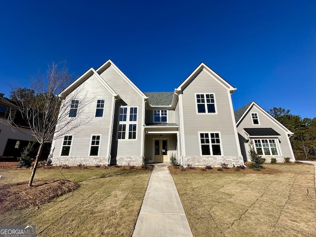 view of front facade with a front yard