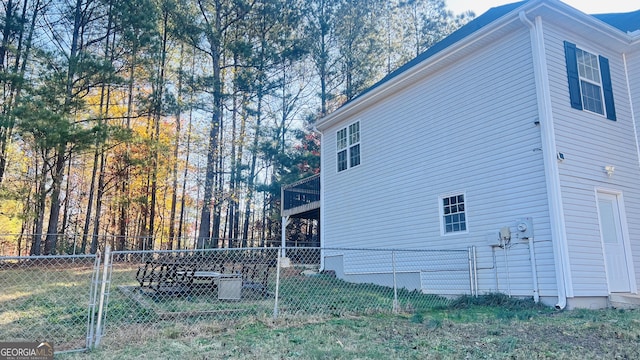 view of home's exterior featuring a yard