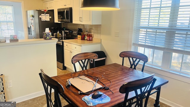 view of tiled dining space